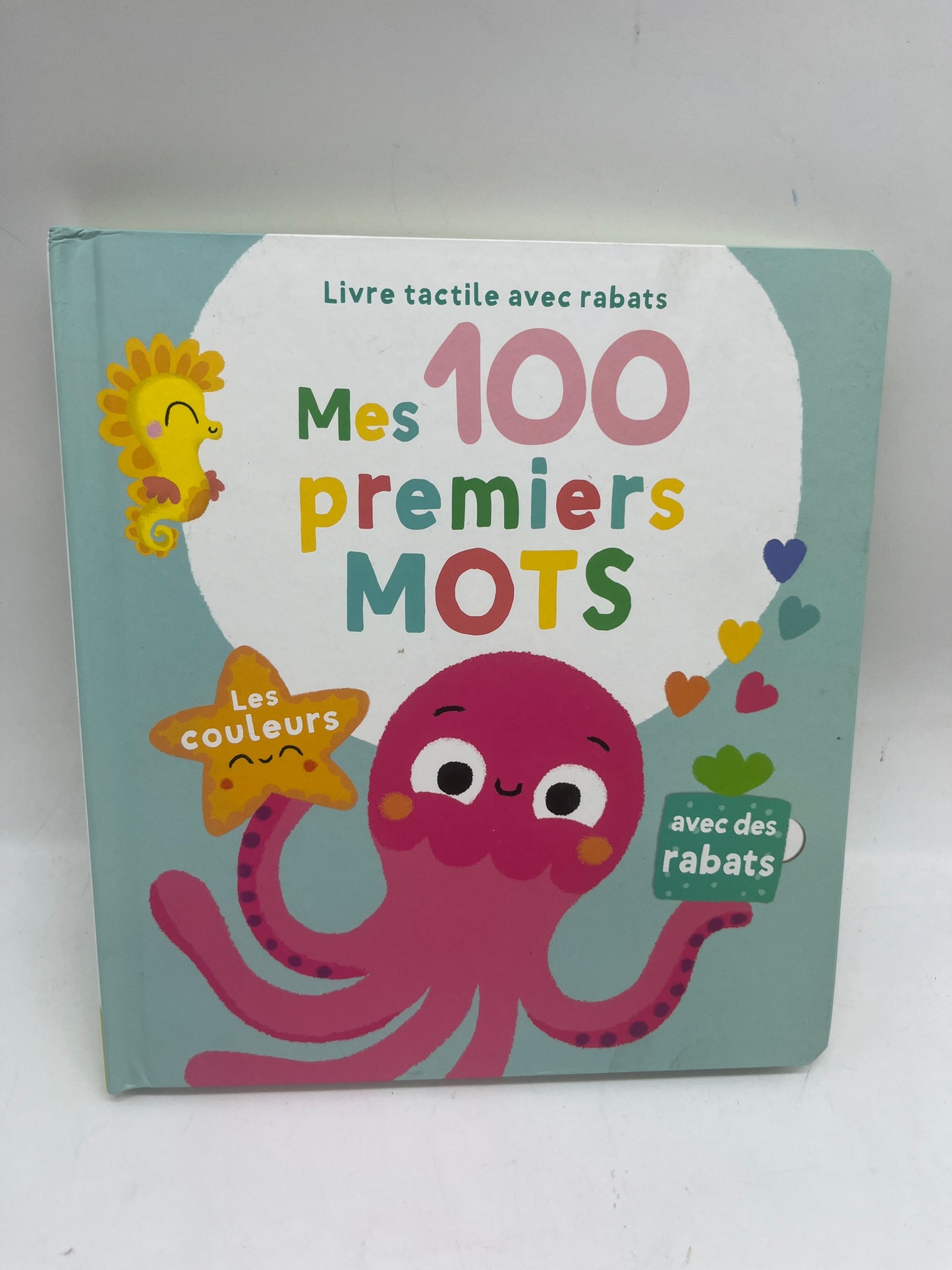 livre Mes 100 premiers mots à  Rabats Ludique Mon album avec 100 rabats  thème les couleurs Neuf